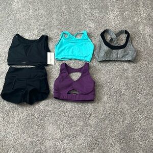 Lot of dancewear tops and black shorts all size AXS in great preowned condition